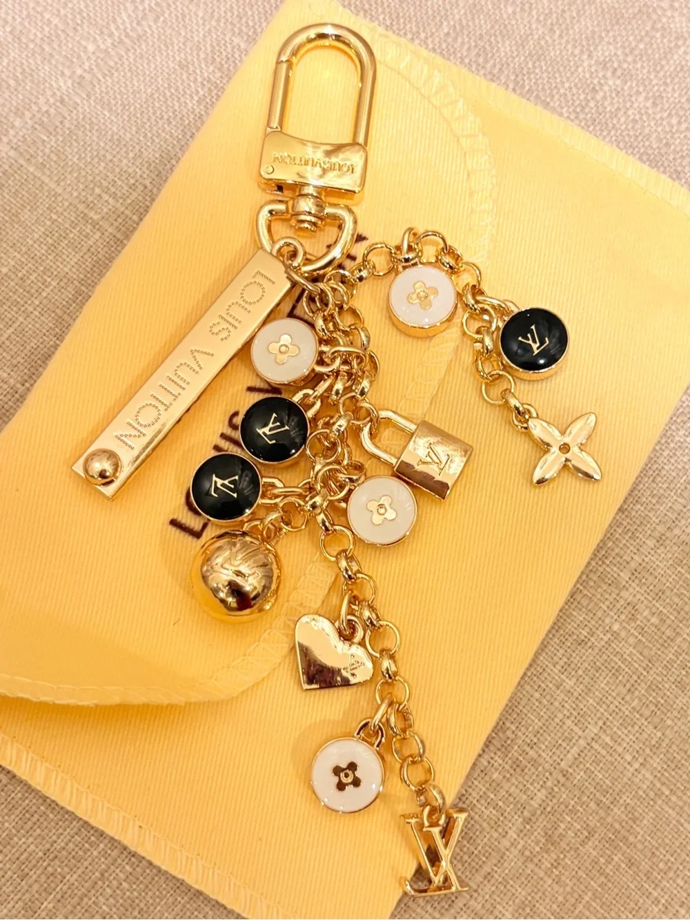 Louis Vuitton Gold Charm Key & Card Holder with Black and White Enamel Accents